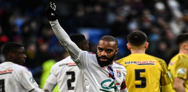 Lacazette hat-trick fires Lyon into last 16