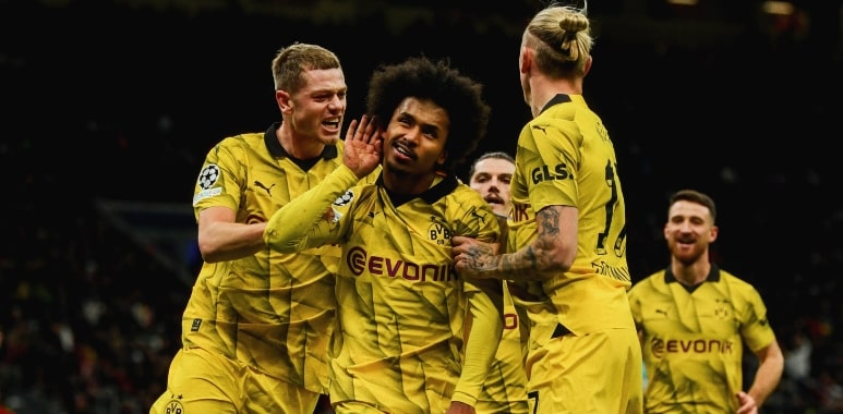 Dortmund's Victory Earns Spot in Champions League Knockouts