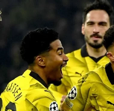 Sancho and Reus Lead Dortmund to Quarter-finals Glory