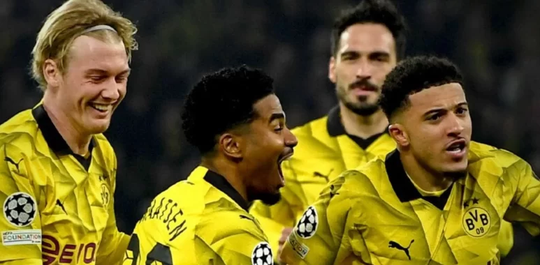 Sancho and Reus Lead Dortmund to Quarter-finals Glory
