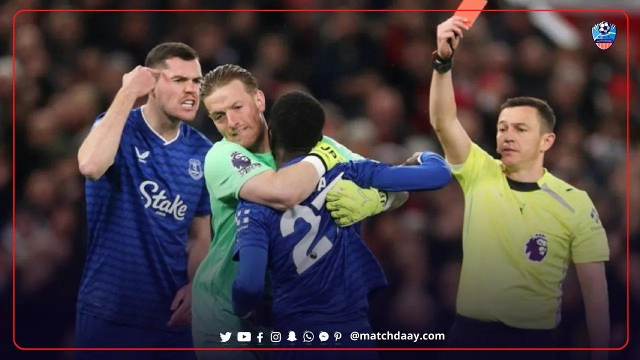 Idrissa Gueye is shown a straight red card for going after his own teammate Michael Keane